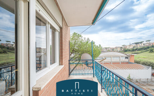 Three-room apartment with terrace and parking spaces